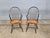 Store Item: Pair of Tiger Maple & Black Continuous Windsor Arm Chairs Bench Made Description: Each Chair has a black...