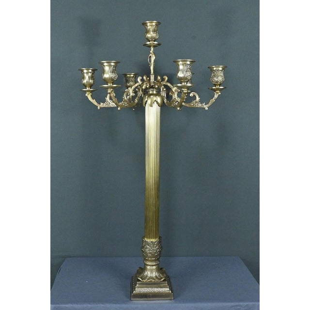 This large bronze candelabra with 7 arms of light is a true jewel of decorative art from the end of the 19th century. Its...