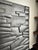 Modern Minimalist Geometric Patterned Wall Panel Wall Art Beltre by Made Goods in Dark Stone Black Ash Gray Reconstituted Stone For Sale - Image 12 of 12