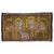 A late 20th century Turkish rug depicting 2 lions outlined in yellow and a pink sheep outlined in light blue on a brown...