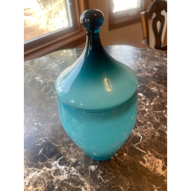 Glass Vase in two-tones of Blue. Ball-top lid in dark blue. Frosted glass interior.