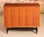 Mid Century G-plan Librenza tola and black chest of drawers with brass handles, circa 1960s. Two top drawers have 3...