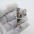Full of retro charm and playful humor, this vintage silver figurine depicts a tennis player in the iconic, cartoonish...