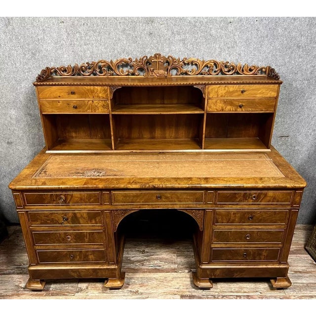 Imposing and rare Charles X period presbytery desk in burr walnut, circa 1820 Front opening with 13 drawers Used leather...