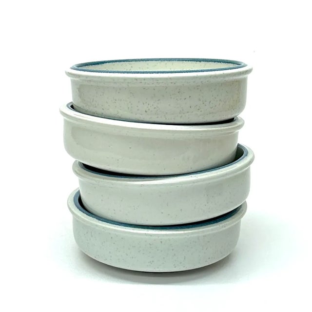 White and blue bowls, set of 4. This beautiful ceramic set was crafted by Mikasa. Made in Japan during the mid-20th...