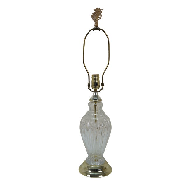 Mid to late 20th century crystal vase shaped table lamp with bright brass base and pattern of incised almond shapes....