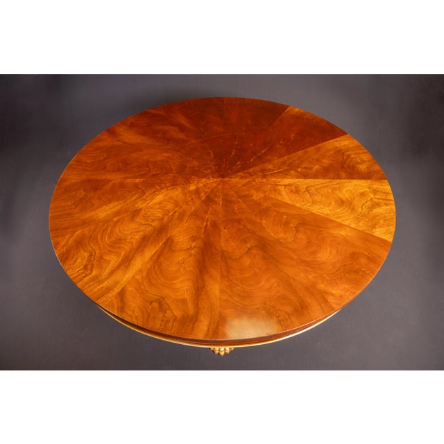 George IV Regency style, large round dining or huge center table with Dolphin gilded base. The base is solid hand carved...