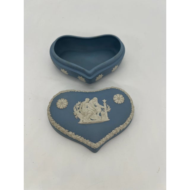 Vintage blue jasperware heart-shaped trinket box by Wedgwood. Classic Wedgewood blue box with white accents.