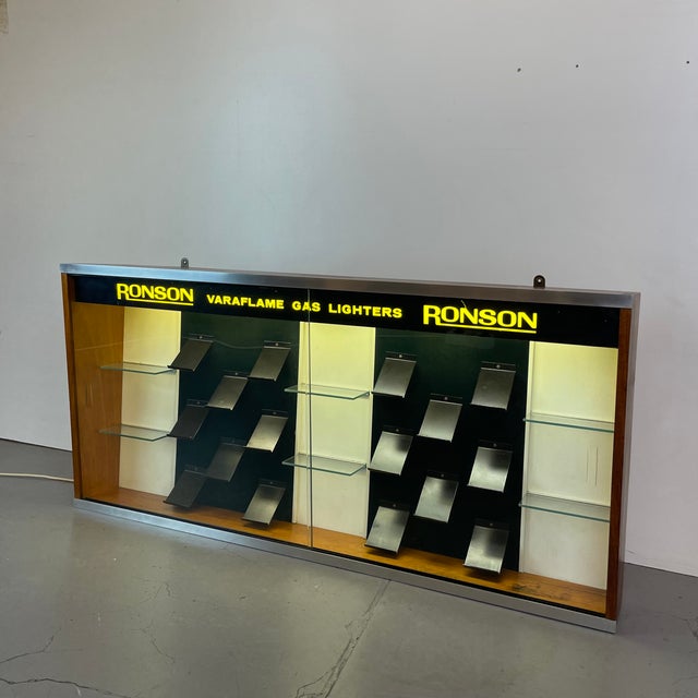Beautiful vintage countertop or wall-mounted display cabinet made of a wooden frame with a sleek aluminum trim and sliding...