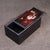 A beautifully crafted Chinese rectangular box, likely made of Huali (rosewood). The box features a sliding lid that opens...