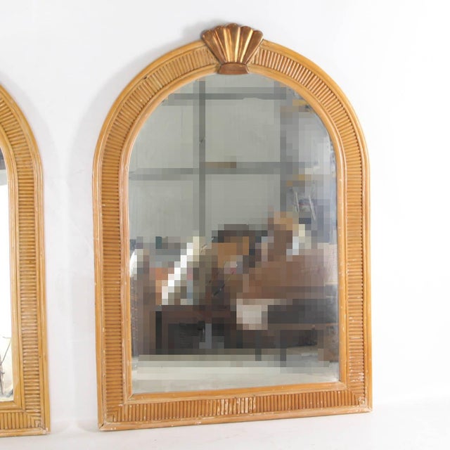 Rare pair of rattan mirrors with copper tops from the 1970s. Beautifully patinated, these mirrors stand out thanks to the...