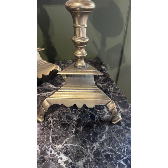 Pair of 18th-Century French Brass Candlesticks Tall, sculptural French brass candlesticks with baluster stems, generous...