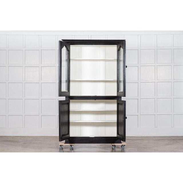 Circa 1890 19thC French Ebonised Glazed Cabinet. W121 x D42 x H198 cm Internal shelf depth 28.5 cm Weight 76 kg.