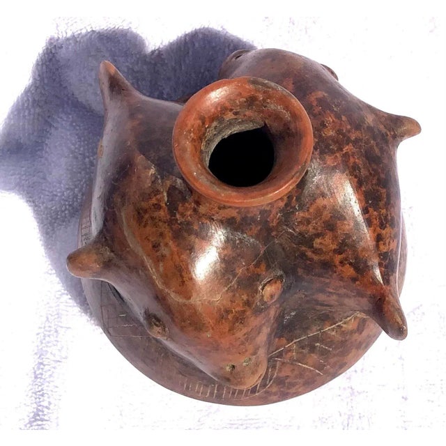 A beautiful Reproduction of a double fish effigy vessel.