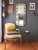 This tall chinoiserie vintage mirror features a faux tortoiseshell finish on a faux bamboo frame. The octagon shape and...