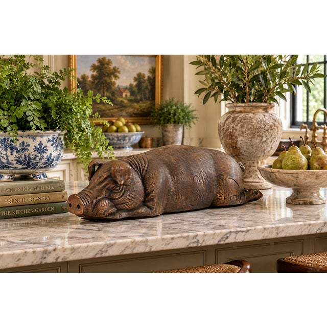 Large vintage cast bronze reclining pig sculpture, circa 1980s, measuring an impressive 16.5 inches long with richly...