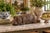 Large vintage cast bronze reclining pig sculpture, circa 1980s, measuring an impressive 16.5 inches long with richly...