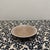 Infuse your space with the warm, rustic charm of the desert with this Southwestern-style hand-painted pottery plate. This...