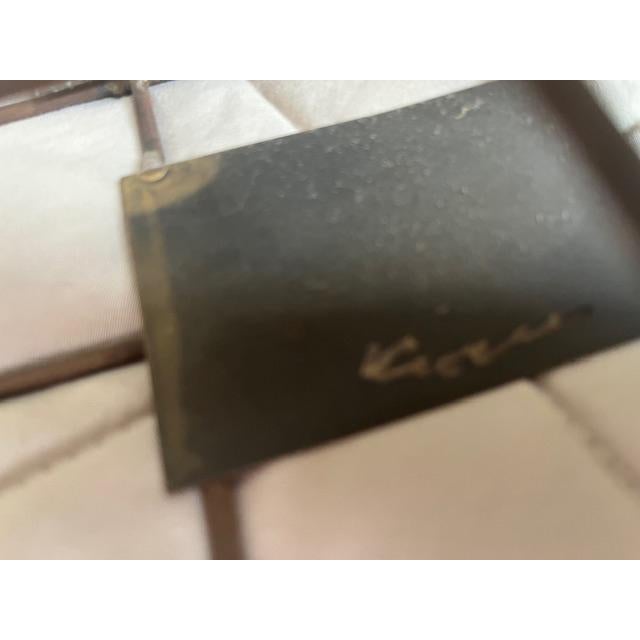 Mid-century brutalist metal wall sculpture. Metal disks welded to metal rods. 3 layers of disks. Bronze, silver & black...