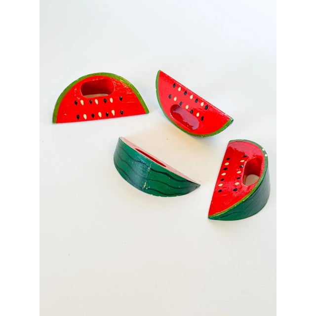 A charming set of four vintage hand painted folk art watermelon napkin rings. The detail on these is so fun and whimsical,...