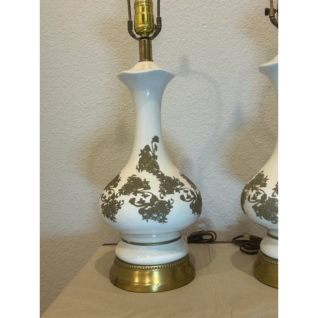 This vintage Glass lamp features lace design in gold, adding a touch of elegance to any room. The medium-sized lamp is...