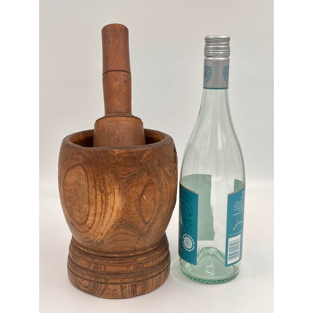 Beautiful antique French wooden mortar and pestle with a primitive, rustic, and industrial apothecary look. This turned...