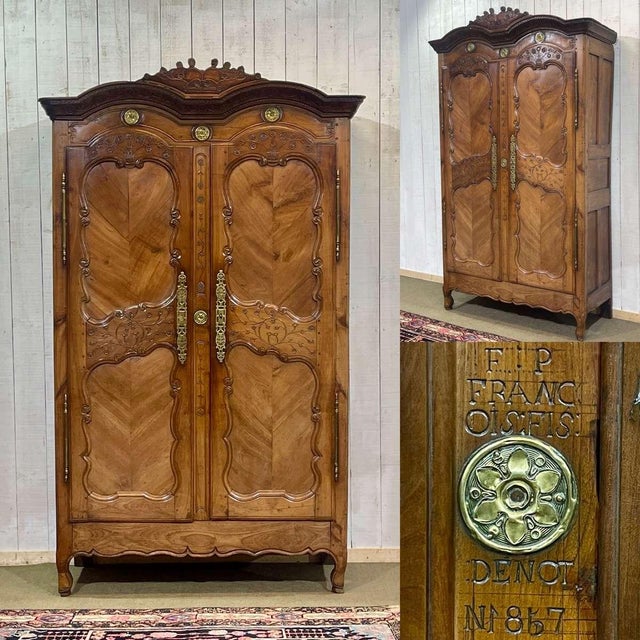 Rennes wedding armoire in cherry wood, dated 1857 and signed François fils Denot - H=2m42, D=54cm, W=1m40. This piece has...