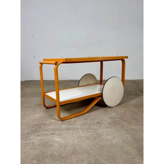 Alvar Aalto – Model 901 Serving Cart, Artek The elegant Model 901 serving cart, designed by Alvar Aalto and produced by...