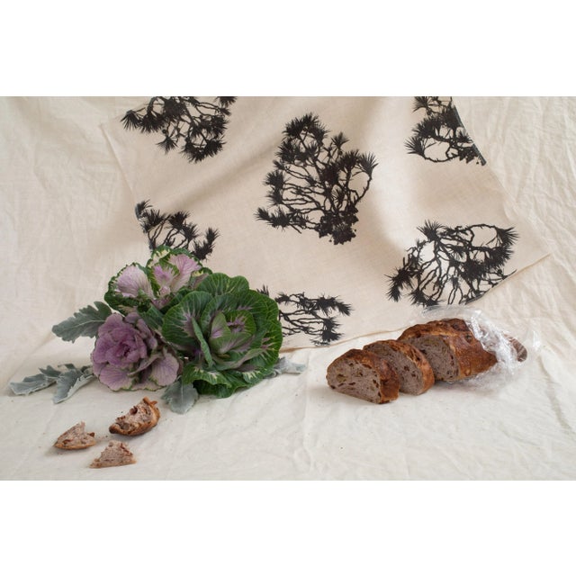 Our Brazil Tree Black fabric by the yard is printed with water-based pigment ink. 100% Linen Horizontal repeat: 26.7"...