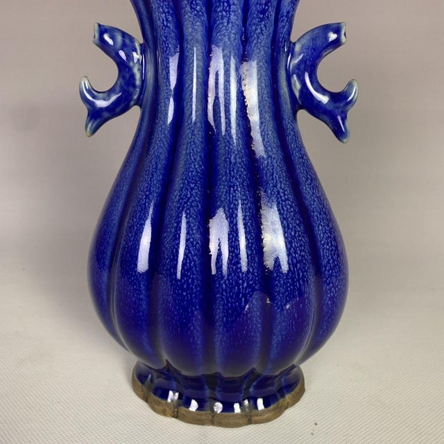 Make a bold statement in your home with this striking cobalt blue glazed vase. Featuring a vibrant, deep blue finish and...
