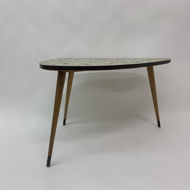 Dimensions: 95cm W, 61,5cm D, 57,5cm H Period: 1960's Material: Brass , wood, stone.