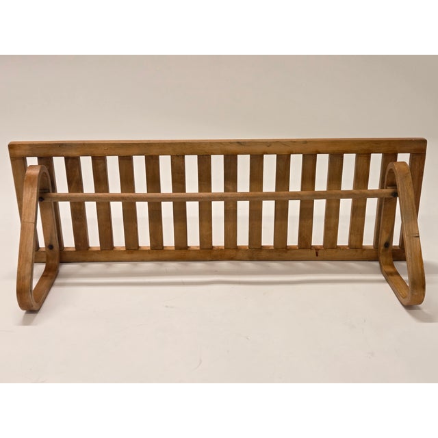 An old dowel-jointed coat rack by Artek, designed by Alvar Aalto. The coat rack is from around the 1930s and has an old...