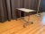 A side, mobile table from the 70s. In original and very good condition. High quality of chrome-plated steel, aluminum and...