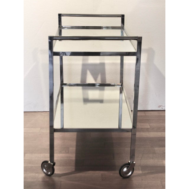 This modernist bar cart was designed by Art Deco designer Jacques Adnet (1901-1984) in France in the 1930s. Typical of...