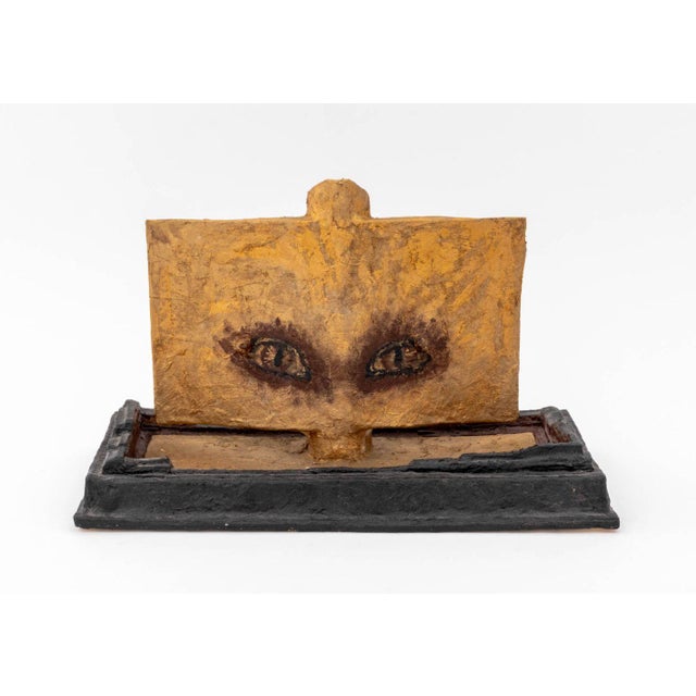 Outsider Art Gilt Painted Papier Mache Eyes Sculpture, unsigned, mounted on ebonized base with acrylic display box....