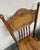 This is a gorgeous full set of four antique oak pressed back barley twist dining chairs dating to approximately 1900–1920....