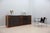 Minimal design for this unusual Italian design vintage sidebaord from late 1970s. It is made of brown laminate with solid...