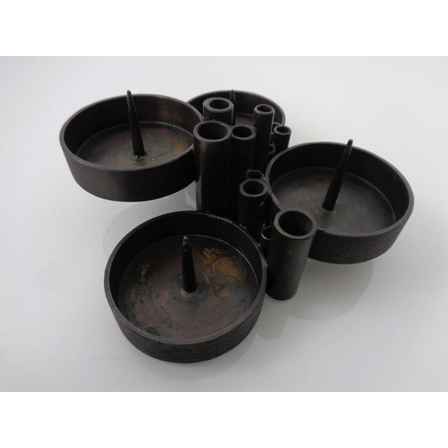 Brutalist candlestick made of blackened bronze by Manfred Bergmeister for the Bergmeister metalworking shop from the...