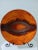 This Poole plate is just shy of 10 inches in diameter. I love the bold orange and red colors. The plate has a very...