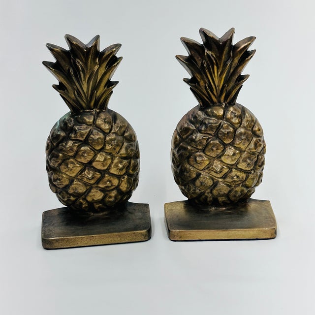 Solid Brass Pineapple Bookends set of 2 These heavy, high-quality pieces are not just functional book supports; they are a...