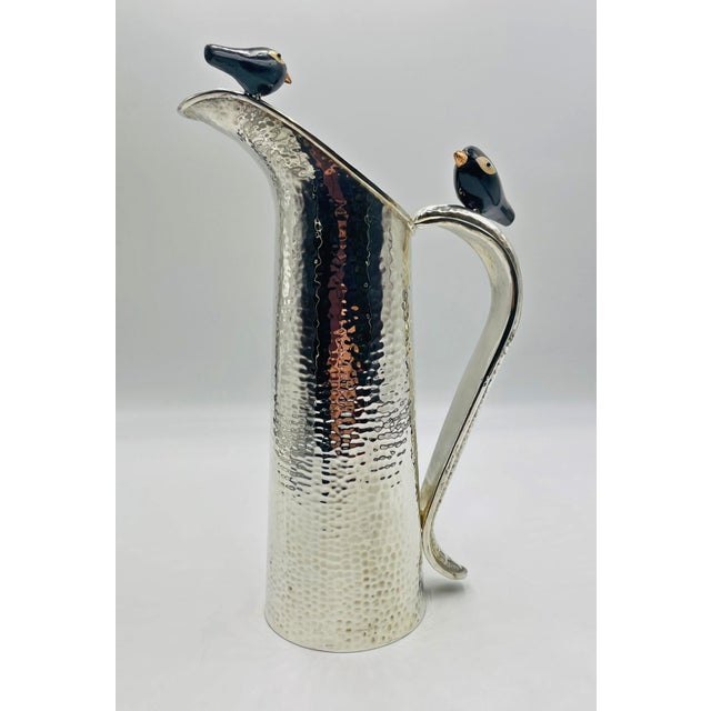 A rare and whimsical large silver-plated water pitcher designed and handcrafted in Taxco, Mexico by renowned artist Emilia...