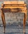 A French Louis XV Style Mahogany and Burlwood Lady's Writing Desk. Dimensions: 27.5" in width, 13.5" in depth and 34...
