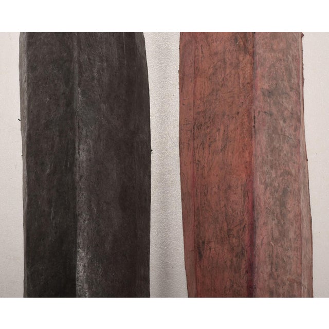 Zarba, five canoe shaped pieces, signed and dated on back "Zarba/1988/Melnick", burnished clay, hand cast paper, and...