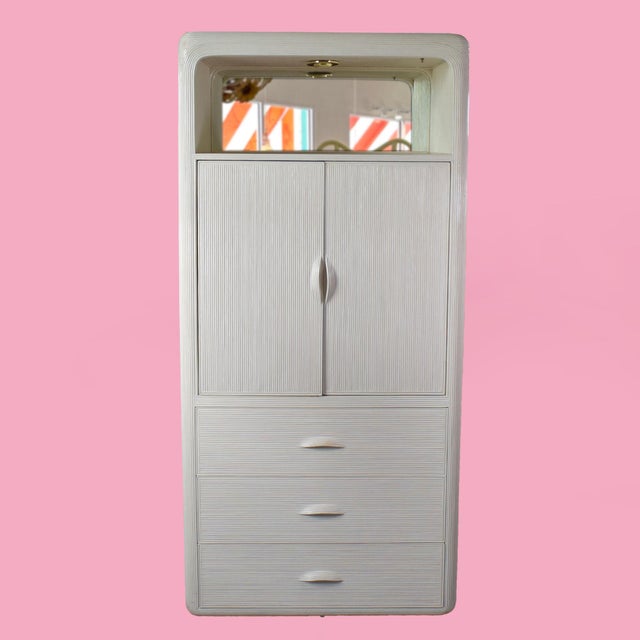 Gabriella Crespi Style Blonde Armoire in nice as found vintage condition. There are minor scuffs, scrapes and wear to the...