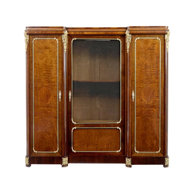 19th century french empire influenced mahogany cabinet circa 1890. this cupboard was constructed using a flat pack...