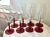 Set of 8 champagne glasses with red stems. Crafted from high-quality glass, these contemporary champagne flutes stand at...