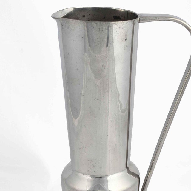 Vintage Tin Jug is an original decorative object realized between the 1920s. Created by Harald Buchrucker; made in...