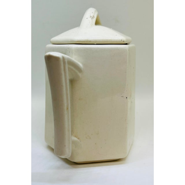 Charming ceramic personal teapot, made by McCoy in the 1940s. Cream color. Great for a child's tea set.