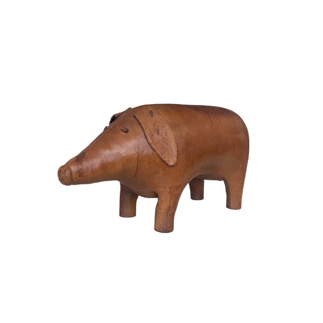 Gorgeous large handmade leather pig footstool / ottoman designed and manufactured in the 1960s by Dimitri Omersa. The tail...