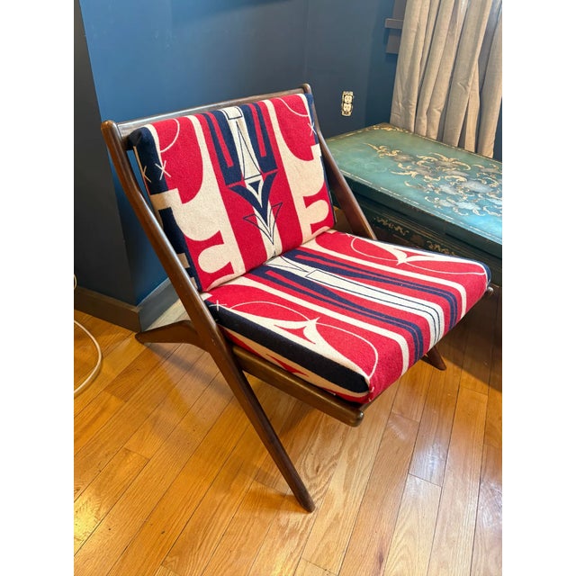 Stunning vintage mid-century, modern walnut lounge chair with Pendleton wool upholstered seat, and back cushions.